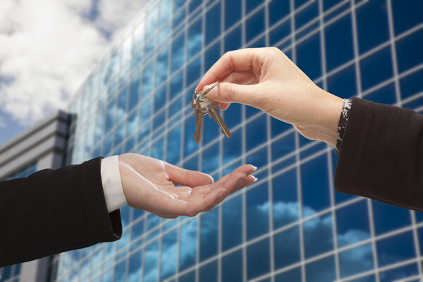 depositphotos_20324639-stock-photo-female-handing-over-the-keys